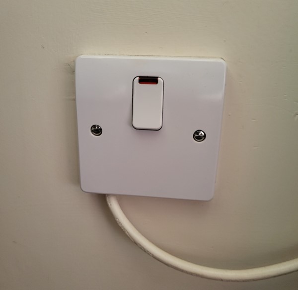 a on/off switch of a power outlet. it is switched off