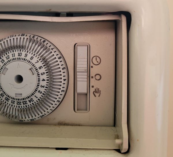 the rightmost switch of the radiator controls