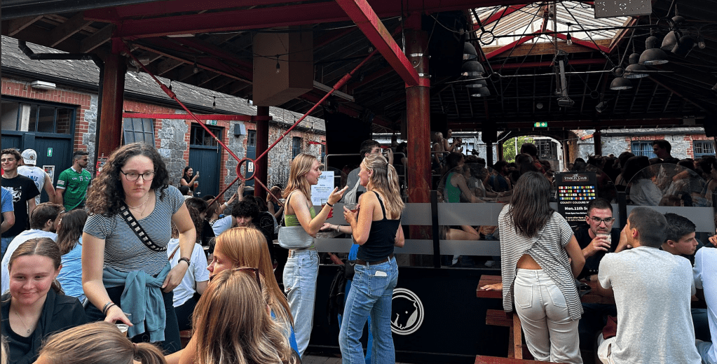 The stables club on campus full of students chatting during a busy day of oreintation week