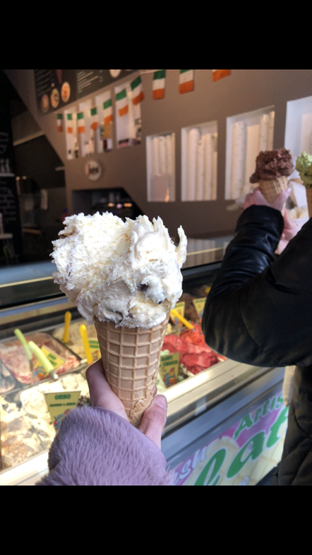 Vanilla ice cream in a cone.