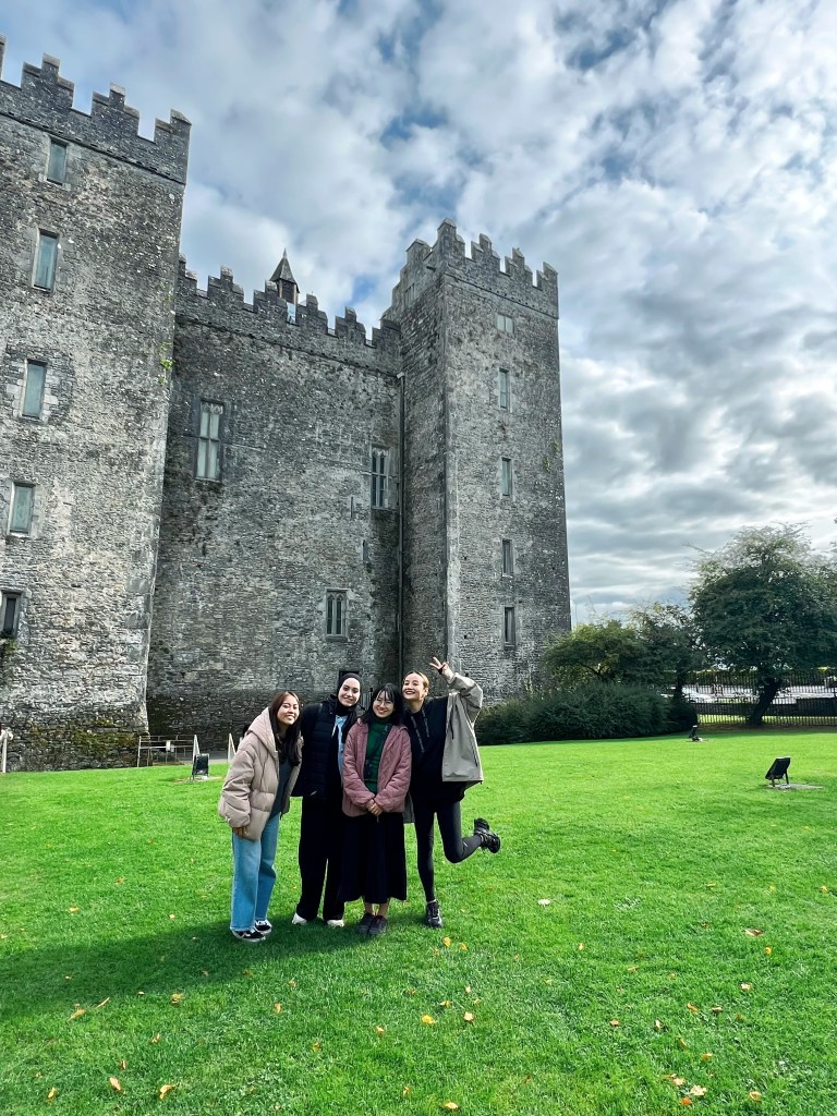 Ha, Raghd, Anna, and Yaqian in front of Bunratty castle