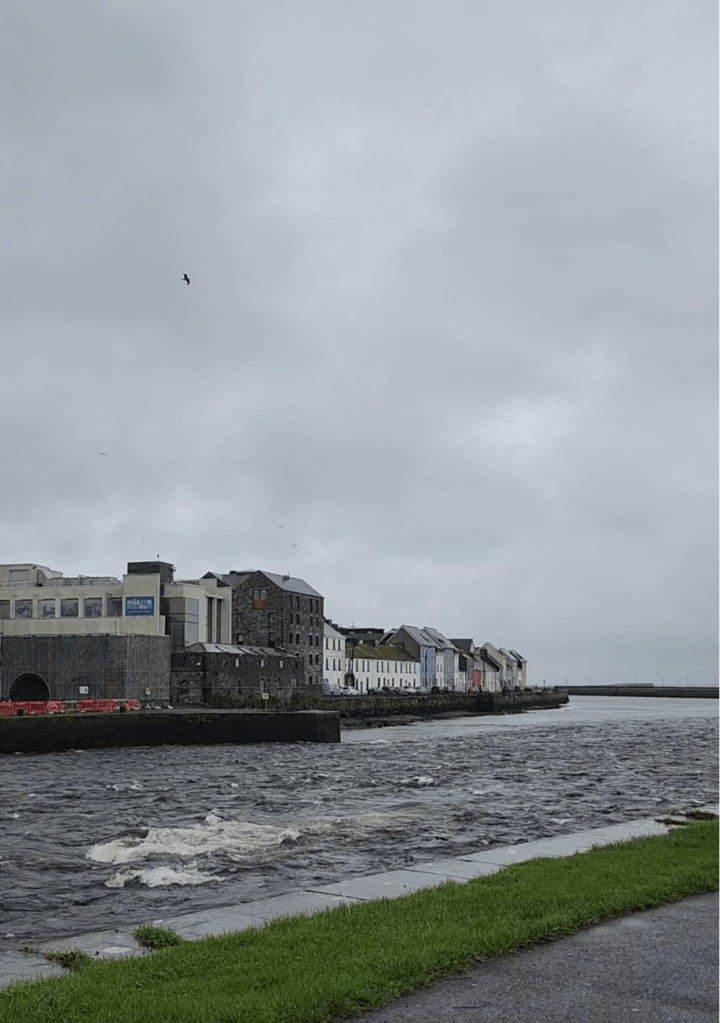 The long walk, a path on the riverside with colorful houses