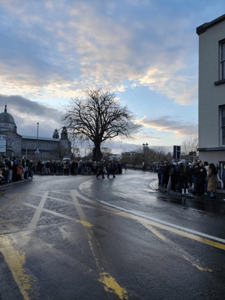 Vanessa's view during the parade. An empty road during the sunset. 
