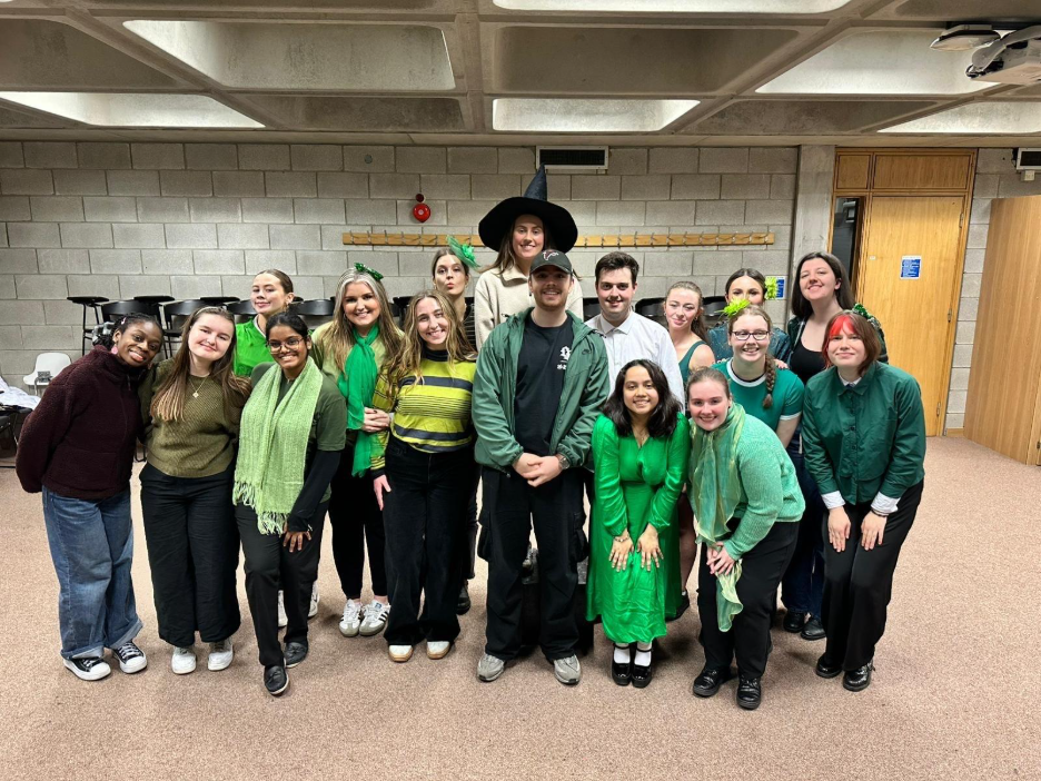 A group of people posing together 