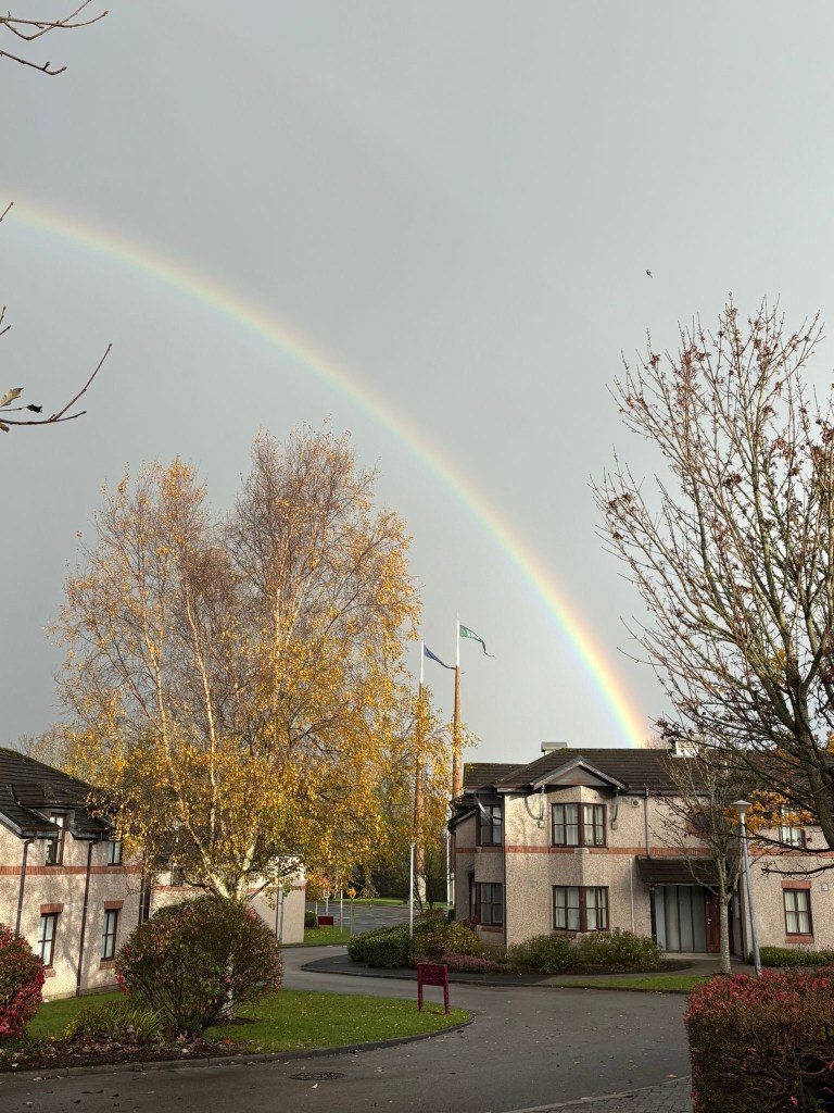 Image of a rainbow surrounding Plassey village.