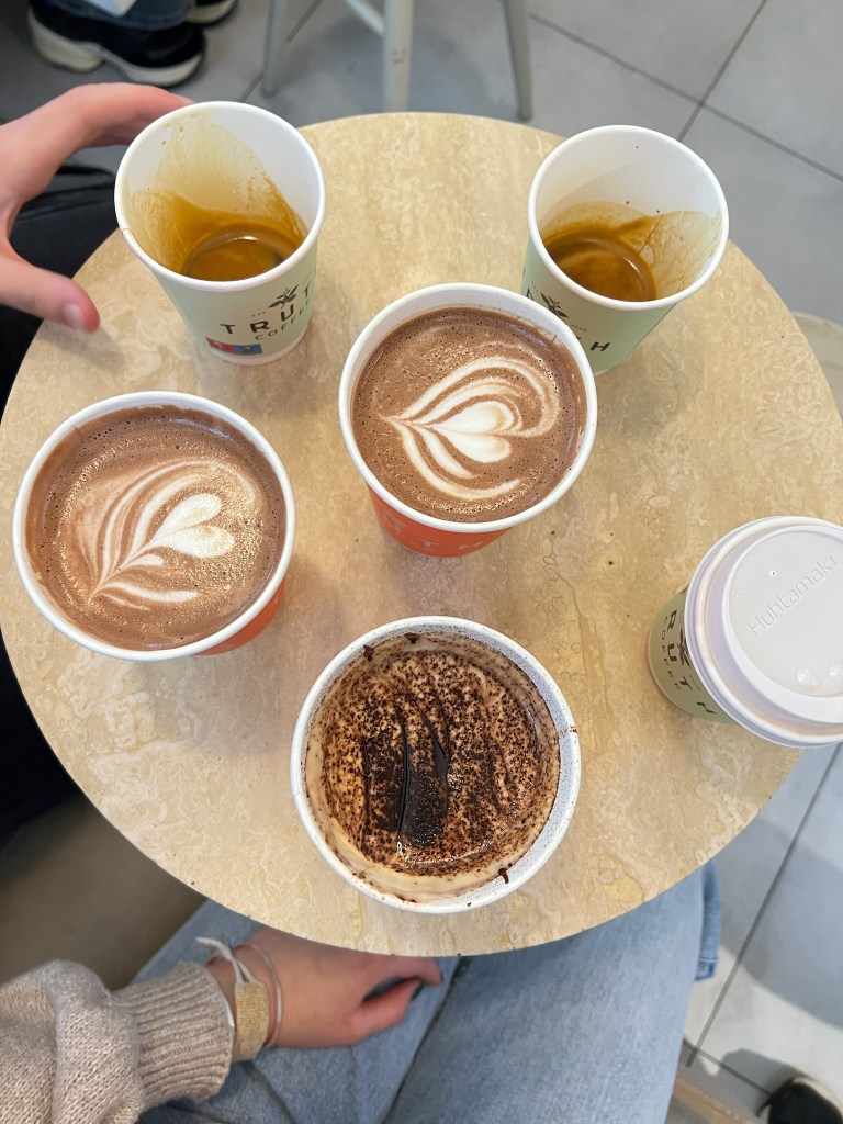 Image of a variety of coffees on a table.
