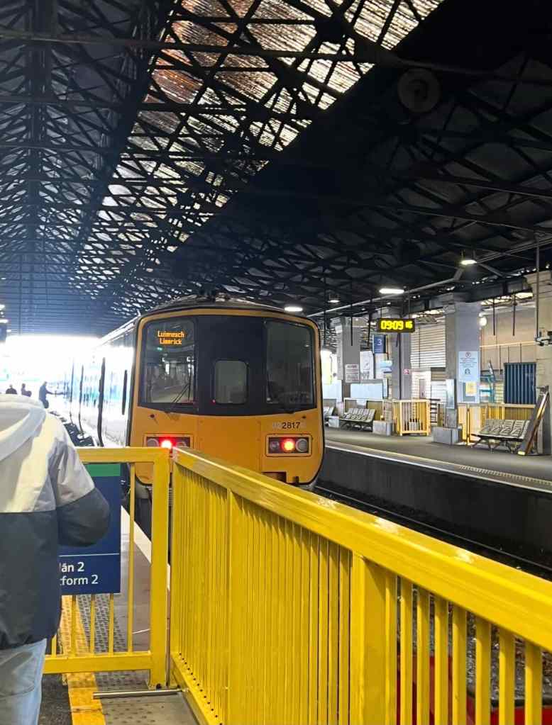 Image of a train pulling up at at Limerick Colbert train station.